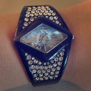 Black crystal watch with a pearly blue face!